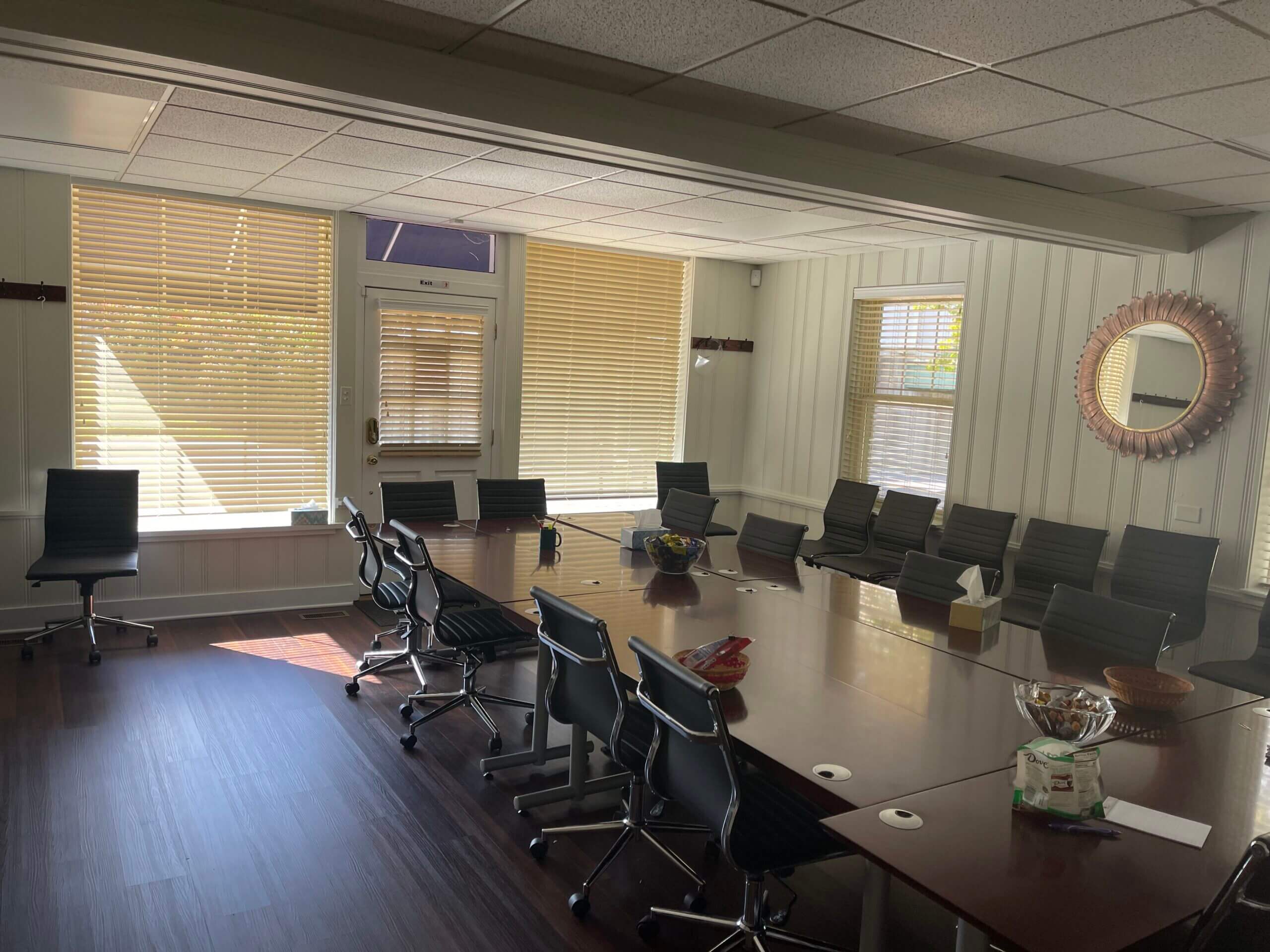 A large conference room with chairs and tables.